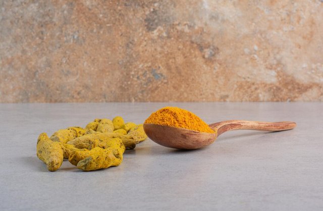 blended-curcumin-powder-wooden-spoon_114579-69886.jpg