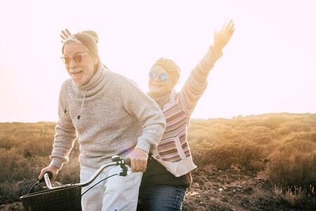 128789350-happiness-for-active-senior-retired-people-lifestyle-concept-joy-old-aged-caucasian-couple-riding-to.jpg