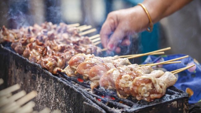 Image result for smoke grilled street  foods in Nigeria 2018