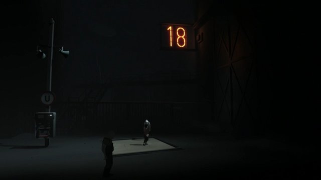 The child stands on a white panel next to a tall headless figure. Above, an illuminated sign reads "18"