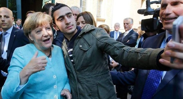 Anas Modamani & Angela Merkel