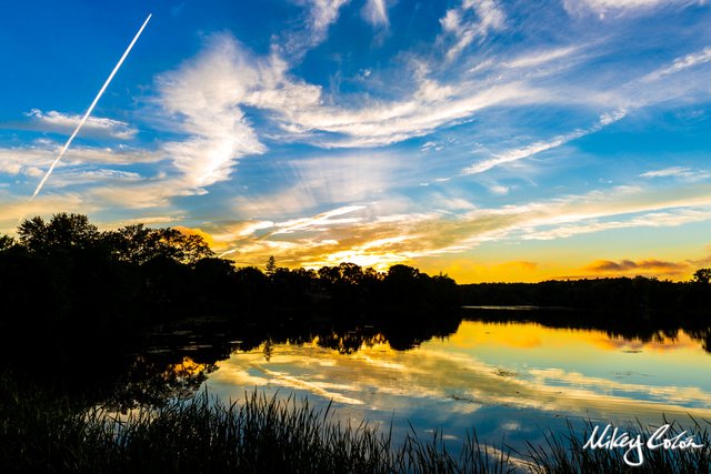 Ell Pond is located in New England - Melrose Massachusetts. The pond offers stunning photo opportunities for sunsets.