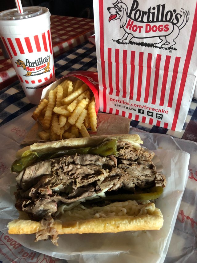https://d1vof77qrk4l5q.cloudfront.net/img/reineddrama-portillos-specializing-in-chicago-style-food-xhwrqbuf-1549747839800.jpg