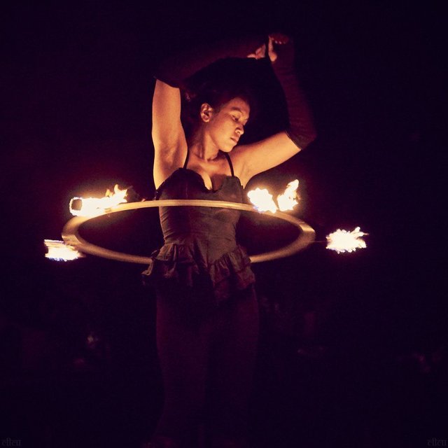 female fire dancer with hoop