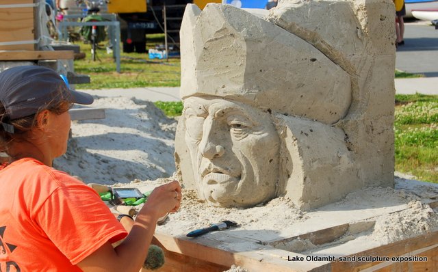 An exposition of Fruit Of Work by a sand sculpture artist