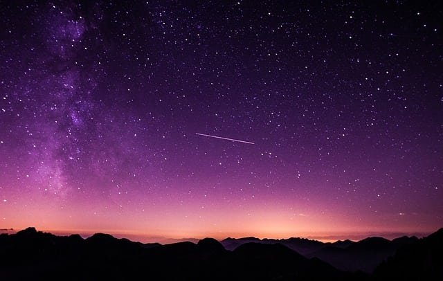 SKY AT DUSK WITH A SHOOTING STAR