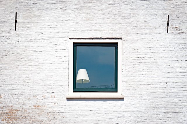 White wall with a window
