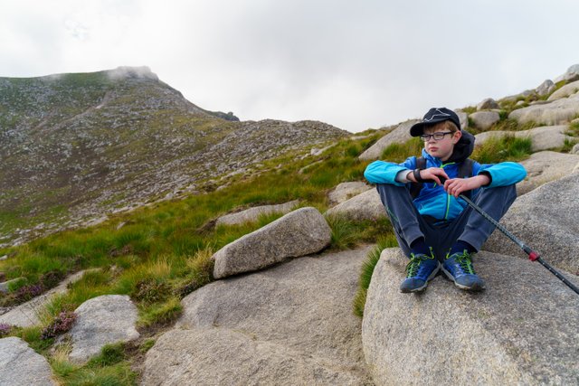 Hamish on a rock