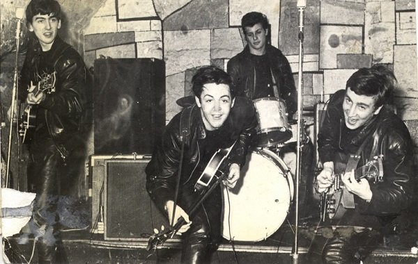 thebeatleswithpetebestatdrumsplayingthecavernclubdecember1961.jpg