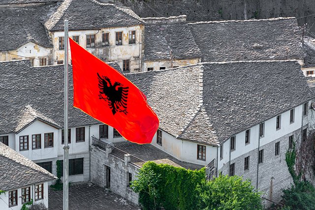 albania_gjirokaster_albanian_flag_stone_roofs_reduced1.jpg