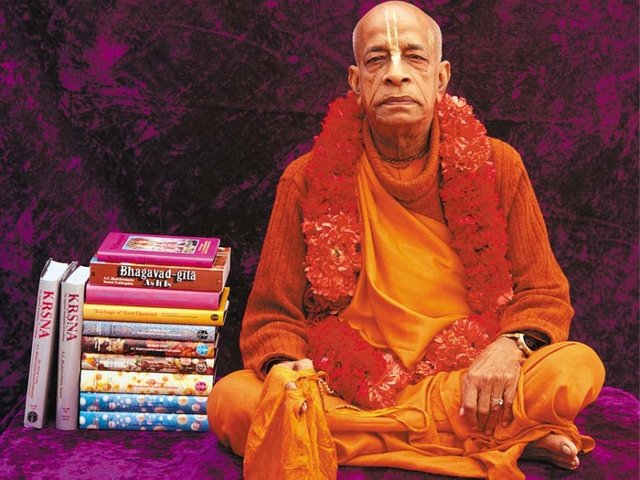 Prabhupada w books.jpg