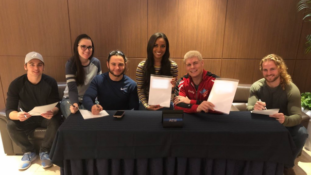 AEW contract signing.jpg