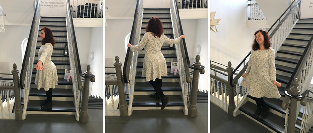 The Eden dress presented on a stairway