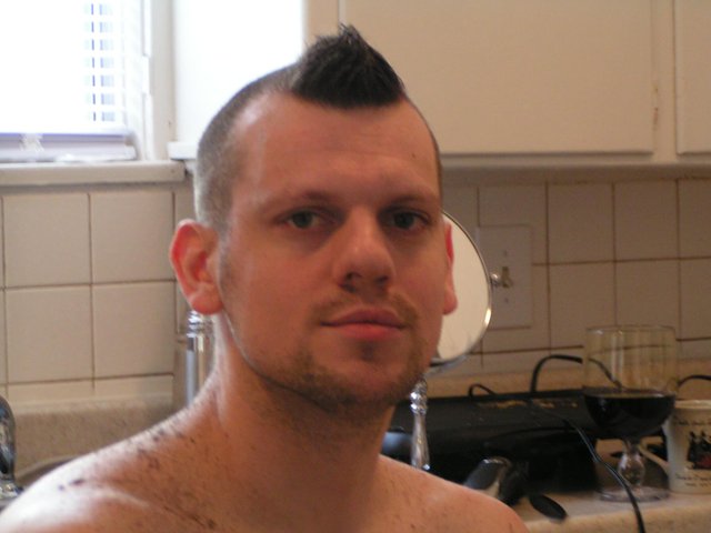 I was in the middle of shaving my head a few years ago and left a little piece for shits