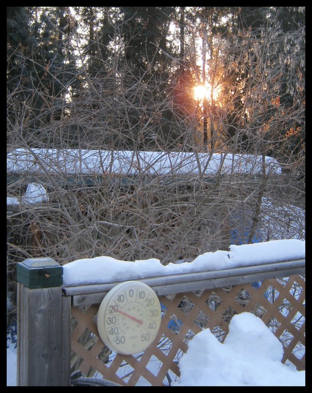 first day of spring sun comes up themometer shows 20 below.JPG