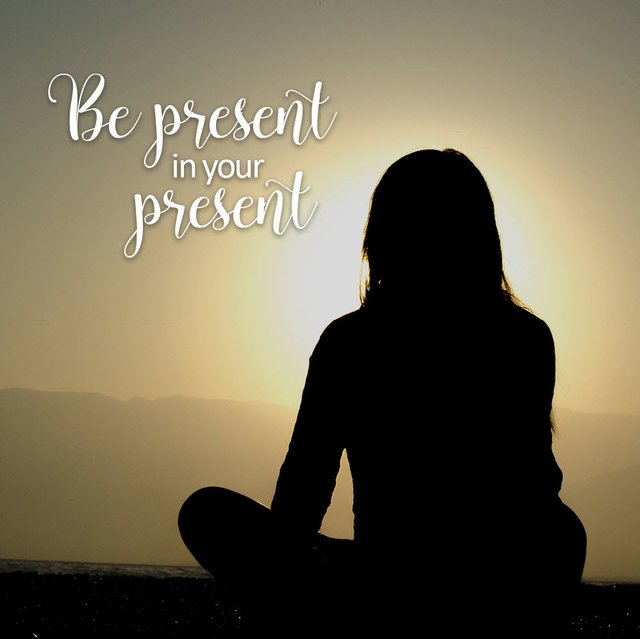 be present in your present siloquette woman sitting looking at sunset.jpg