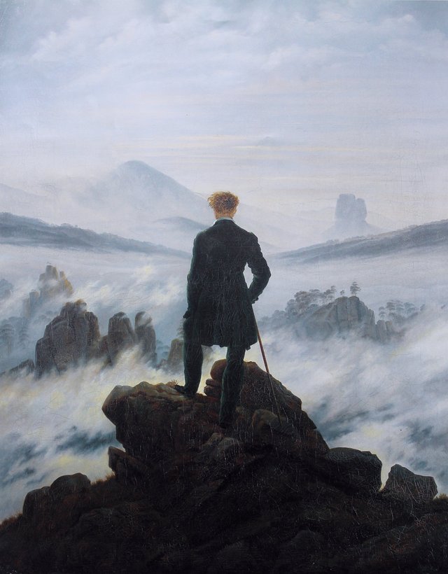 Wanderer overlooking a sea of fog
