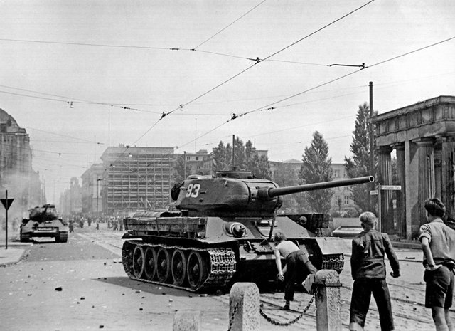 boys throwing stones berlin.JPG