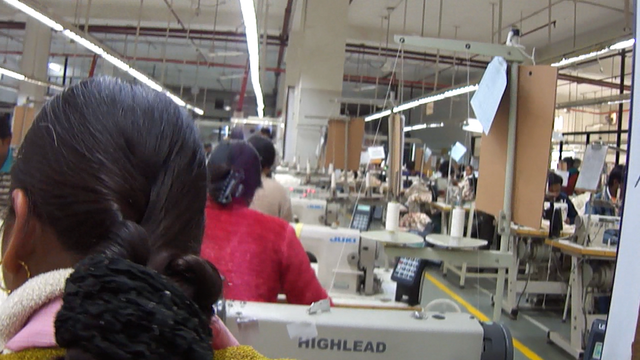garment factory floor assembly line.png