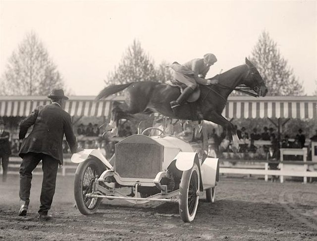 Ralph-Coffin-Jumping-His-Horse-Over-Sylvanus-Stoke’s-Rolls-Royce.-It-was-created-in-1916-by-Harris-Ewing.jpg