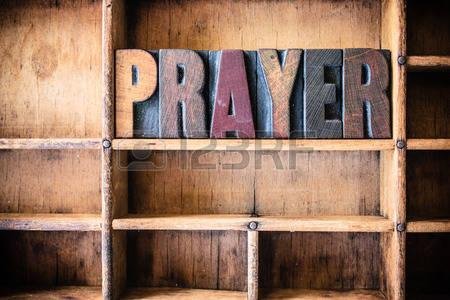 40232422-the-word-prayer-written-in-vintage-wooden-letterpress-type-in-a-wooden-type-drawer-.jpg