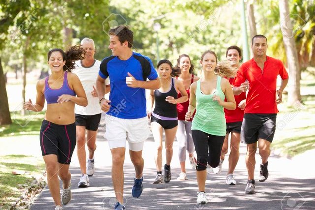 42247824-group-of-runners-jogging-through-park.jpg