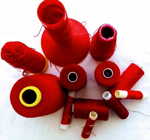 red sewing threads.jpg