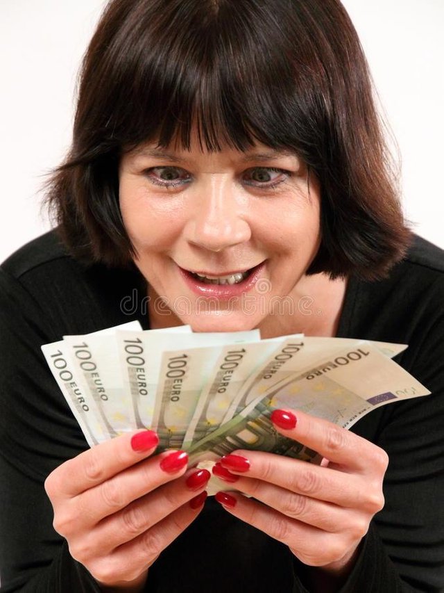 greedy-woman-holding-money-20162578.jpg