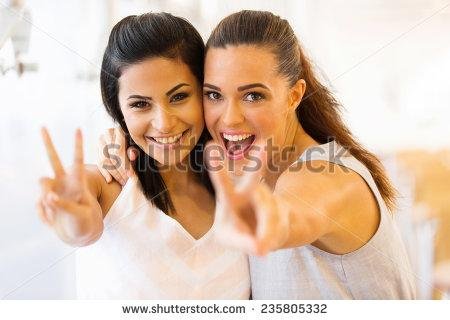 stockphotocheerfultwoyoungfriendshavingfun235805332.jpg