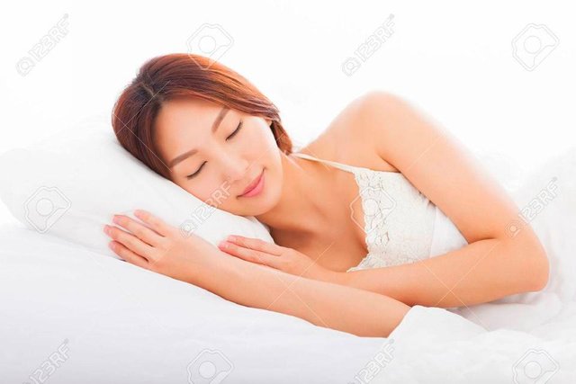 33508395-beautiful-young-woman-sleeping-in-the-bed.jpg