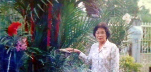mom and her orchids1.jpg