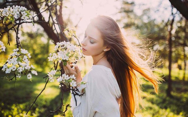girl-hair-in-the-wind-sun-rays-spring-white-flowers-1080P-wallpaper.jpg