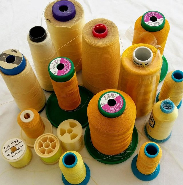 yellow sewing threads.jpg