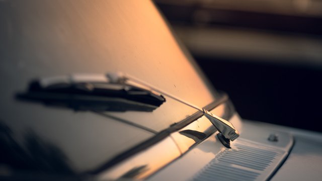 closeup-shot-car-wiper-with-sunset-background (1)