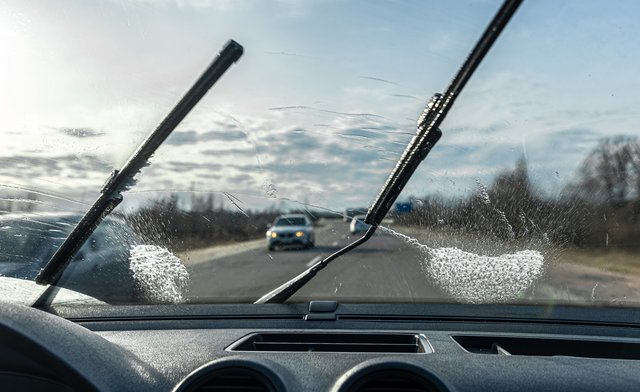 car-wipers-clean-windshields-when-driving-sunny-weather (1)