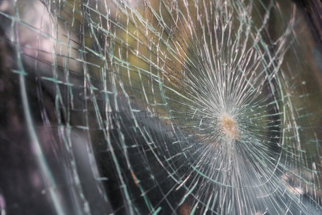 glass-broken-cracks-splinters-front-car-filtered-image (1)