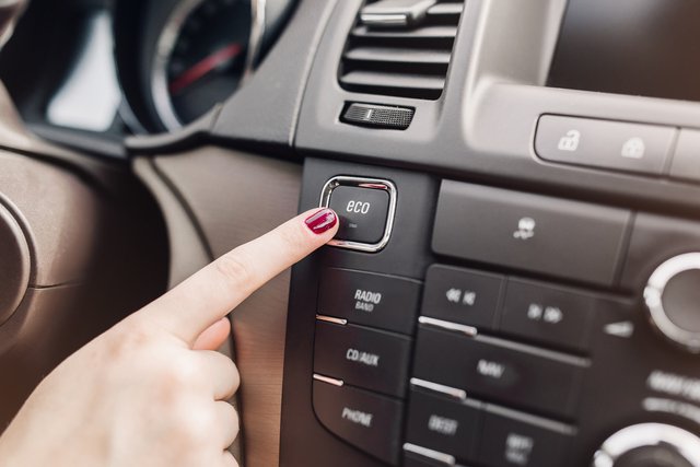 hand-finger-press-button-eco-mode-car (1)