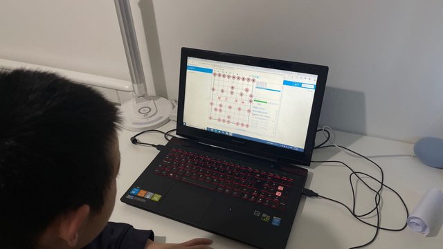 My son plays Chinese Chess vs a Simple Chinese Chess AI