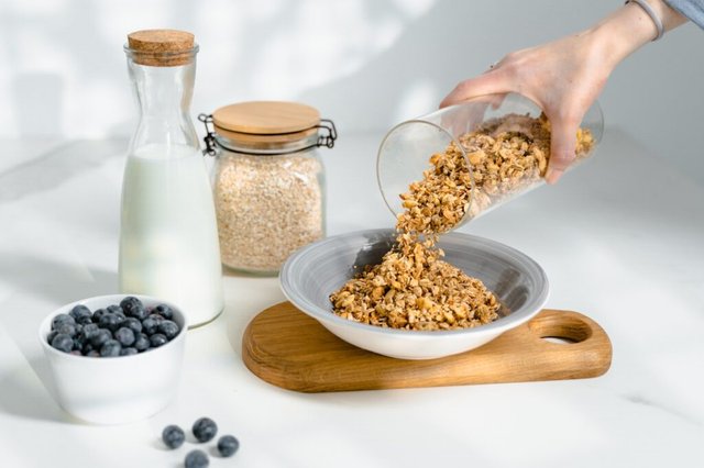 granola into bowl