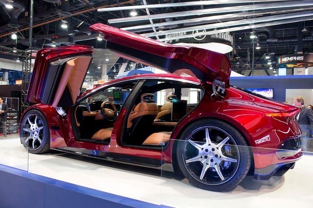 Tesla Rival Unveils Car With 4 Butterfly Doors 643 Km Range