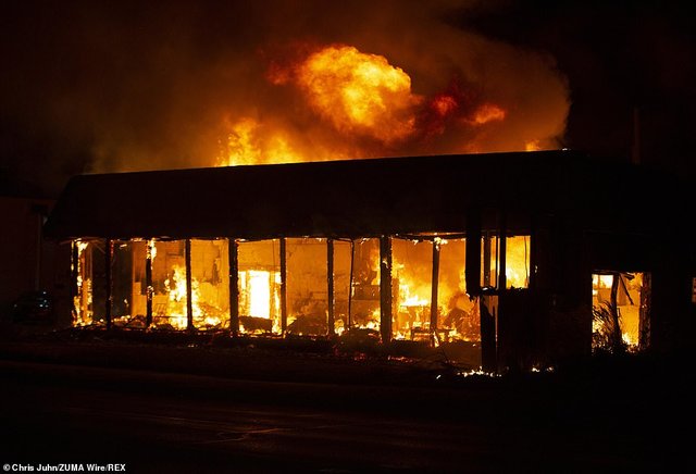 burning State of Wisconsin Department of Corrections in Kenosha