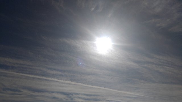 The sun is obscured by chemtrails