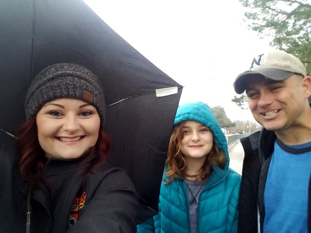 This was last weekend, we are waiting in the rain for the Mardi Gras Parade.  