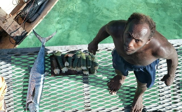 Local fisherman selling fish