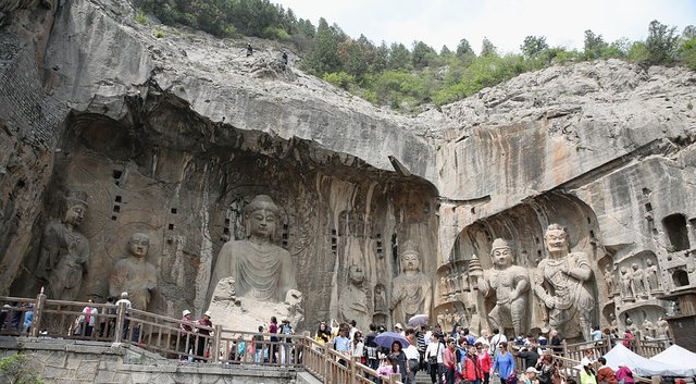 Visitors Attend Fengxian Cave Temple