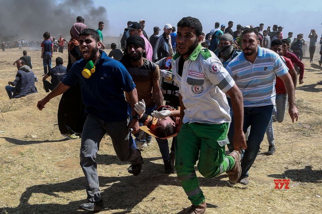 Gaza violence: Thousands attend funeral for Palestinian medic