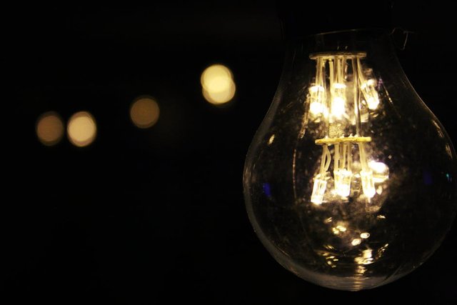 Lighted Bulb during Night Time