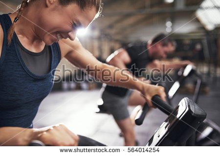 stock-photo-hard-working-sportive-people-doing-cardio-on-exercycle-horizontal-indoors-shot-564014254.jpg