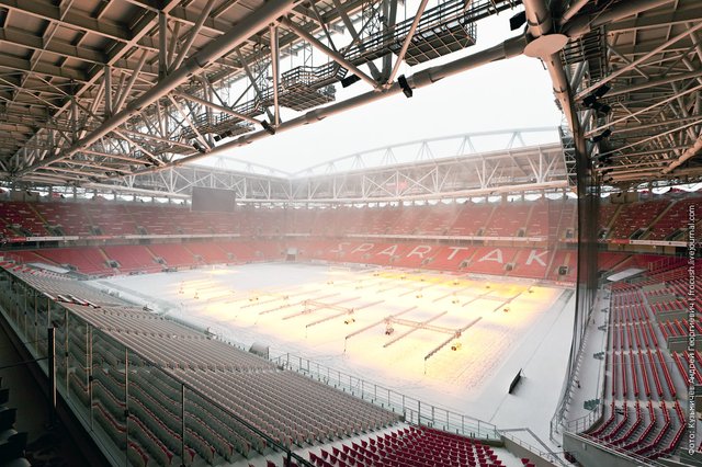 football field under the snow winter Moscow Spartak Stadium Otkritie Arena