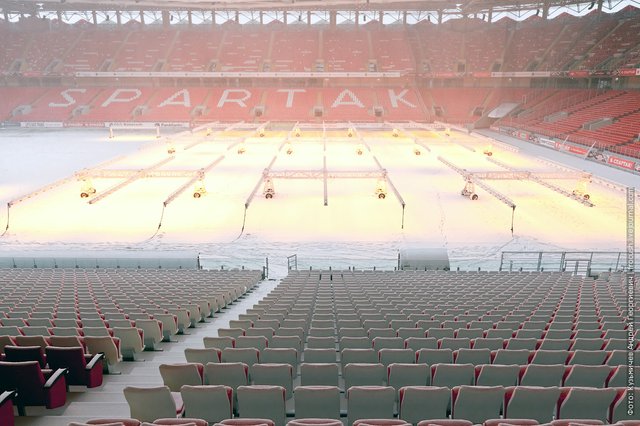 football field under the snow photo stadium Otkritie Arena